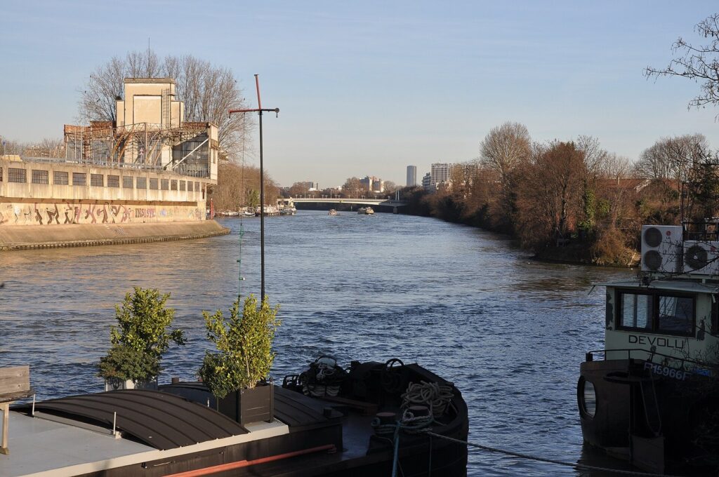 Pont de Billancourt sur la Seine, paysage de la banlieue de Robert Doisneau